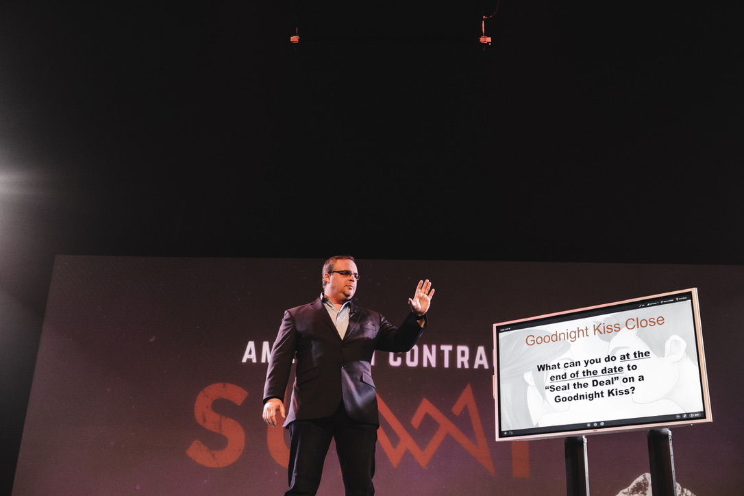 Speaker on stage at American Contractor Summit
